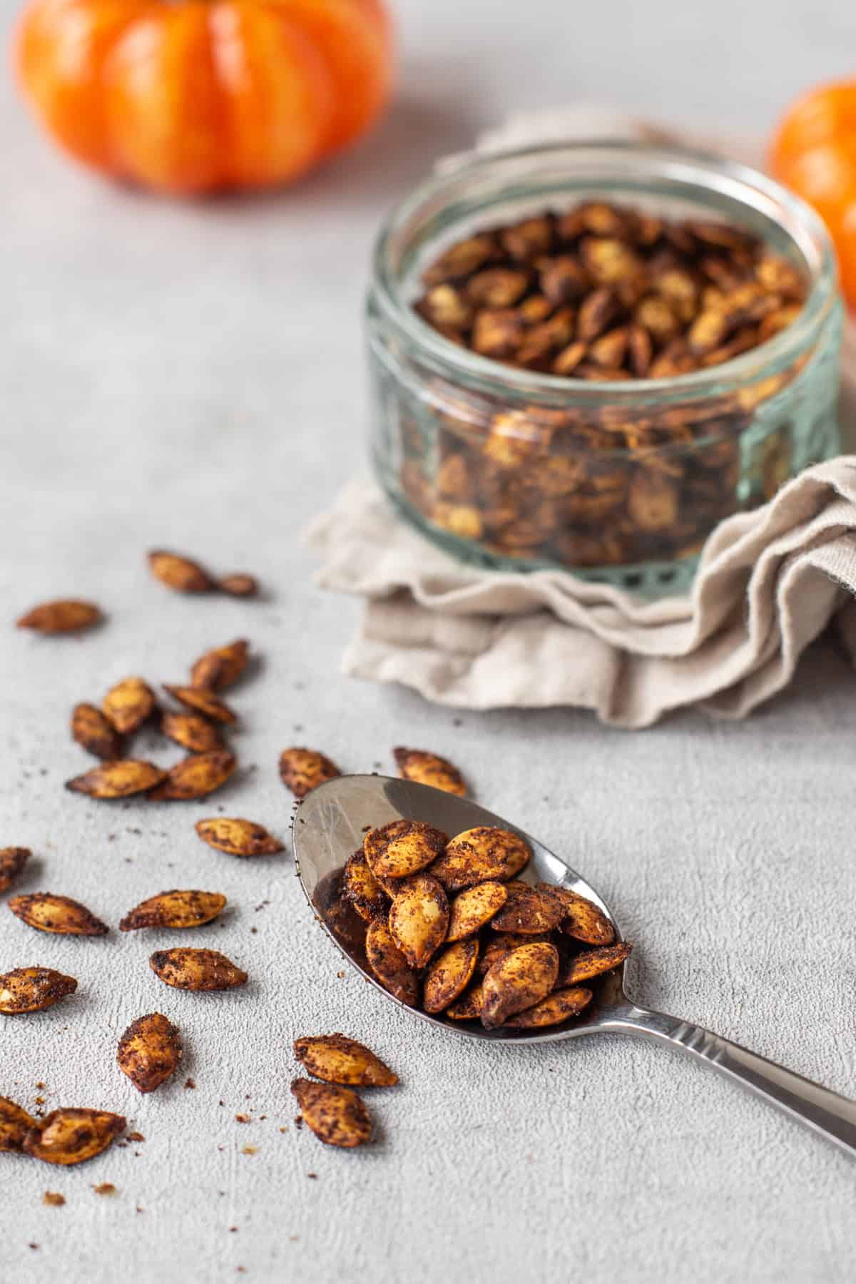 A spoonful of toasted pumpkin seeds.