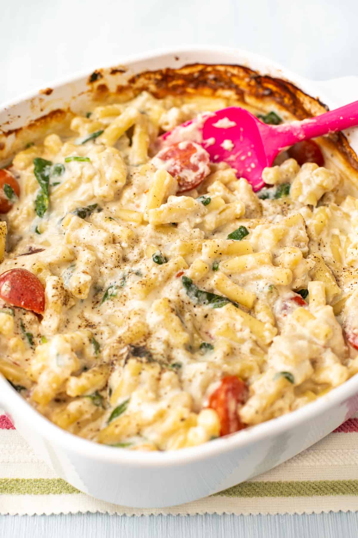 Baked feta mac and cheese in a baking dish.