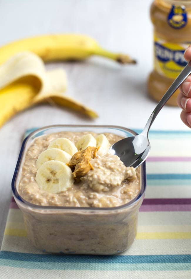 Banana and peanut butter overnight oats - just the thing for a busy morning! A couple of minutes' effort the night before, and you've got a grab-and-go breakfast for the next morning. They're super easy, they're super tasty, and they're healthy too! Vegetarian, vegan and gluten-free.