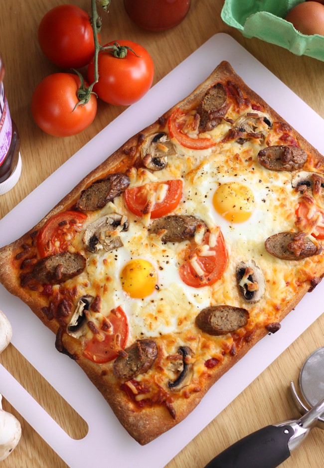 Breakfast pizza. Veggie sausages, mushrooms, pizza and eggs - perfectly reasonable for breakfast!!