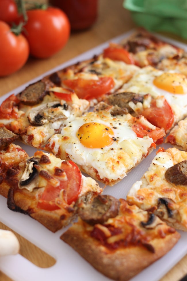 Breakfast pizza. Veggie sausages, mushrooms, pizza and eggs - perfectly reasonable for breakfast!!