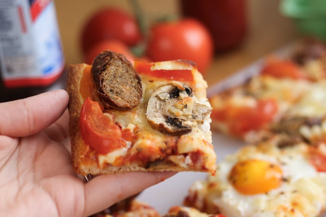 Breakfast pizza. Veggie sausages, mushrooms, pizza and eggs - perfectly reasonable for breakfast!!