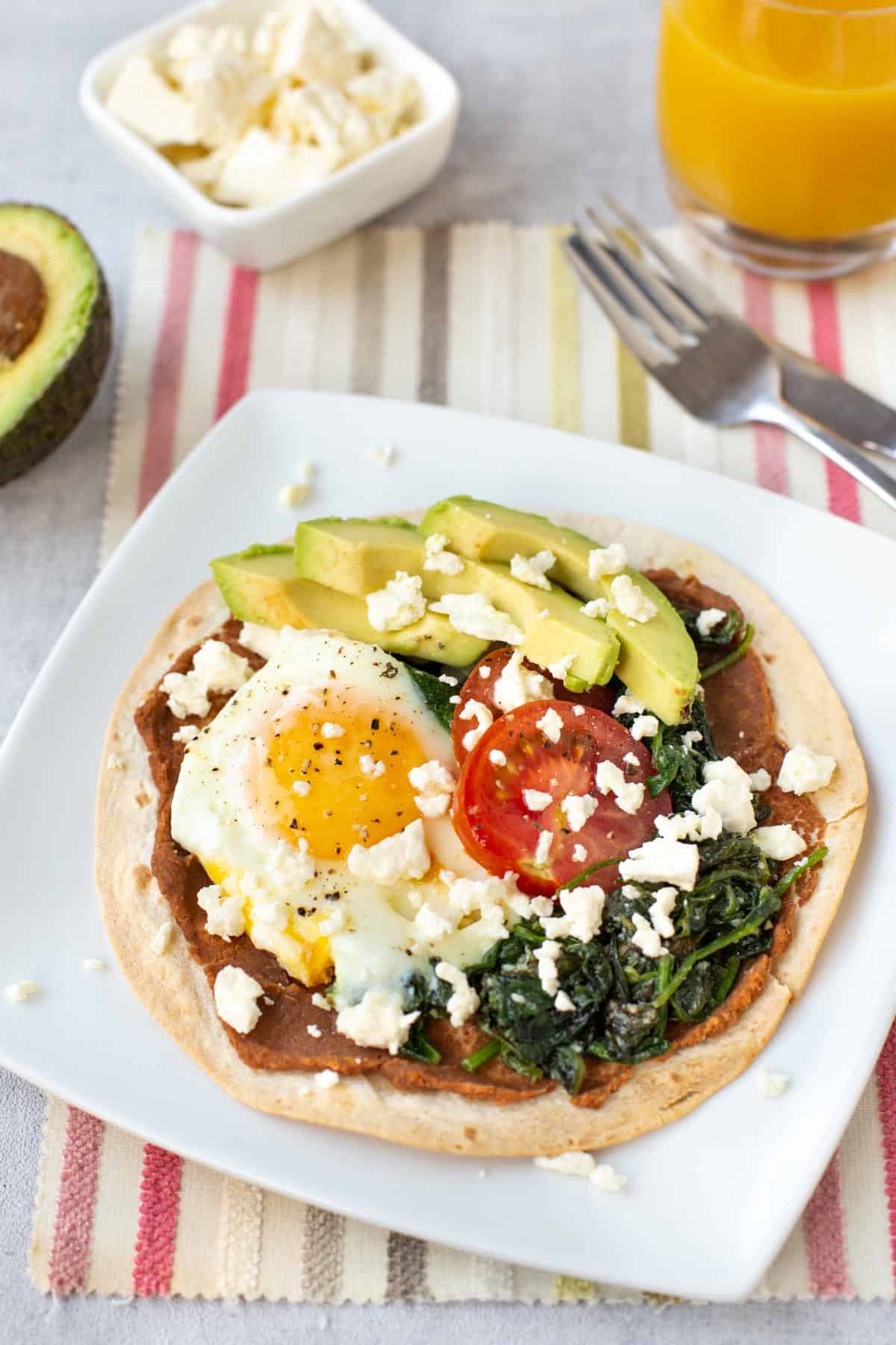 A breakfast tostada served for brunch.
