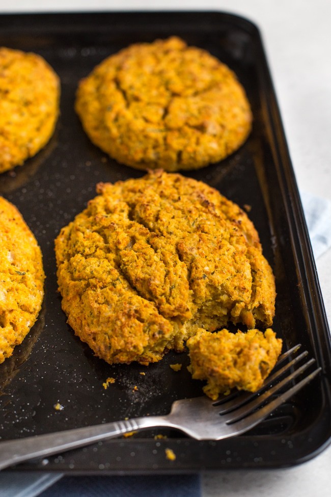 Veggie cutlets on a baking tray with a fork