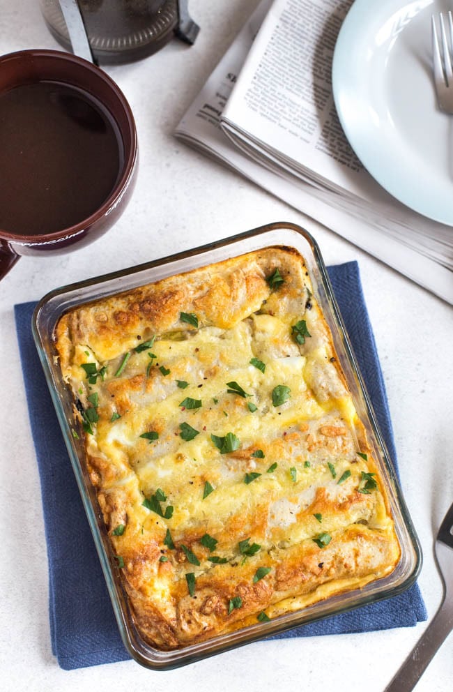 Overhead shot of a baking dish of cheesy tortilla breakfast bake.
