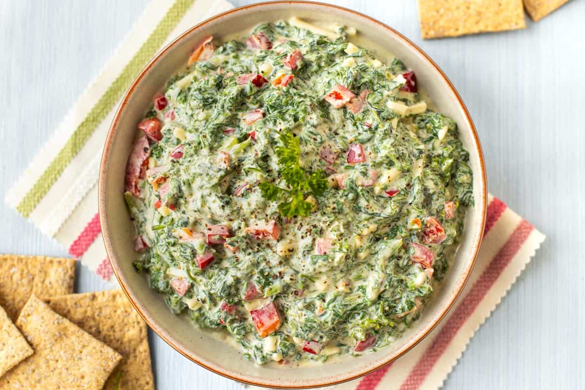 Creamy cold spinach dip in a bowl.