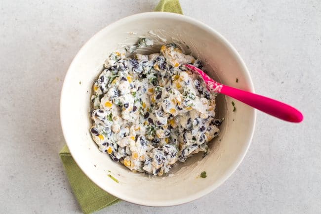 Creamy ricotta and black bean mixture in a bowl