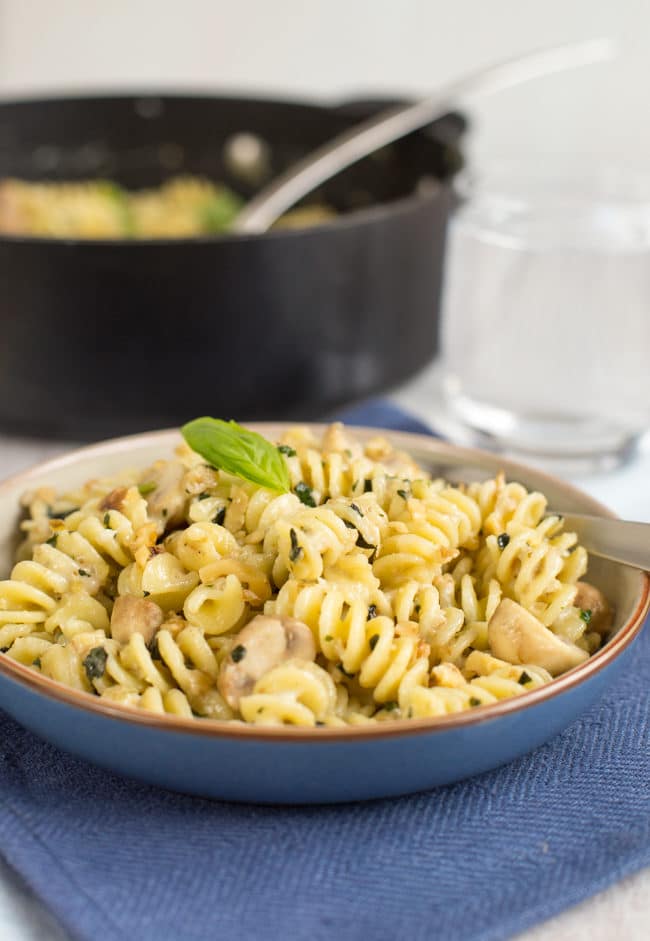 Creamy goat's cheese and mushroom pasta with walnuts and basil. The walnuts add such a beautiful crunch - it's great against the creamy sauce! A brilliant quick and easy vegetarian dinner.