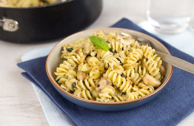 Creamy goat's cheese and mushroom pasta with walnuts and basil. The walnuts add such a beautiful crunch - it's great against the creamy sauce! A brilliant quick and easy vegetarian dinner.
