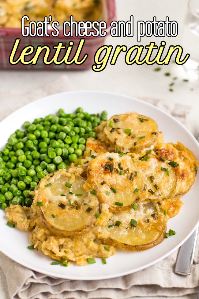 A portion of lentil and potato gratin on a plate with peas