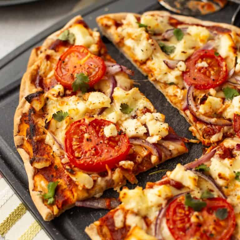Indian pizza with a naan bread base.