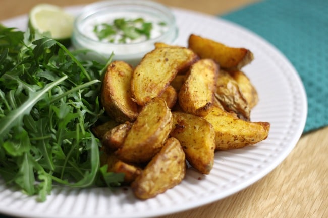Indian spiced potato wedges with coriander lime yogurt