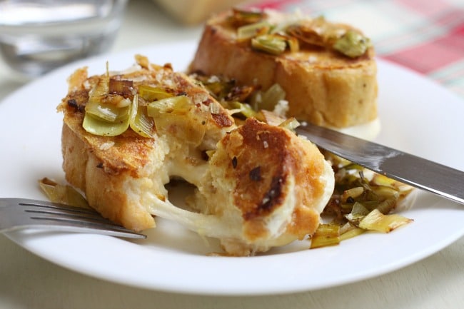 Leek and cheese stuffed savoury French toast - filled with gooey mozzarella, with a crispy parmesan coating, this French toast is great for a lazy weekend brunch!