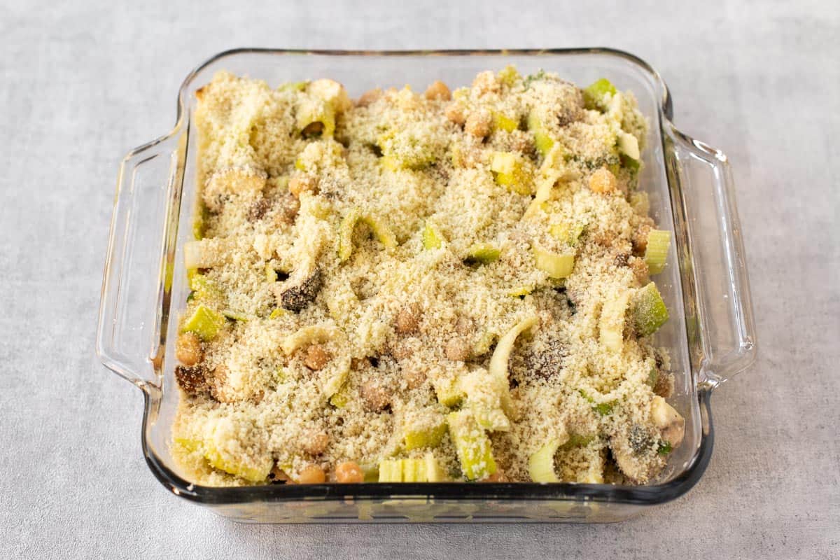 Uncooked chickpea casserole in a baking dish.