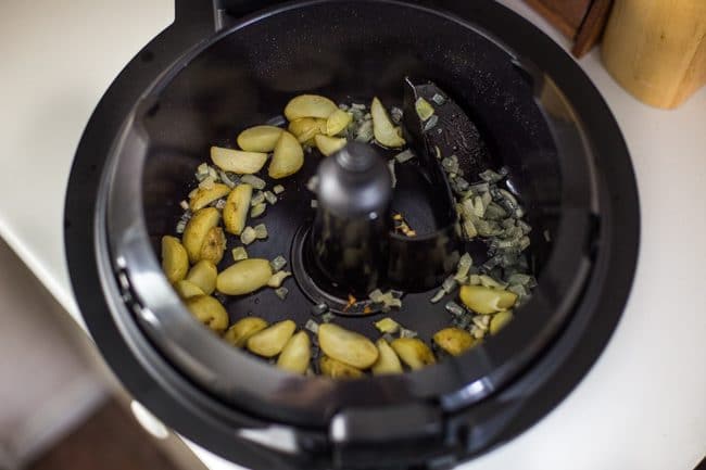 Potatoes and onion cooking in Tefal ActiFry