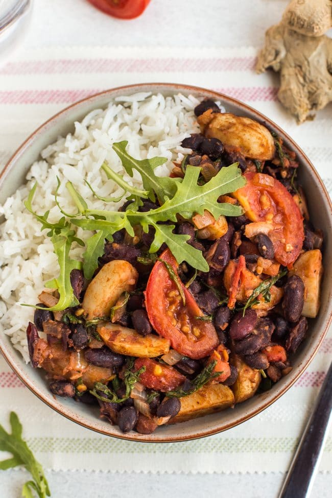 Madagascan bean stew with rice in a bowl, shot from above