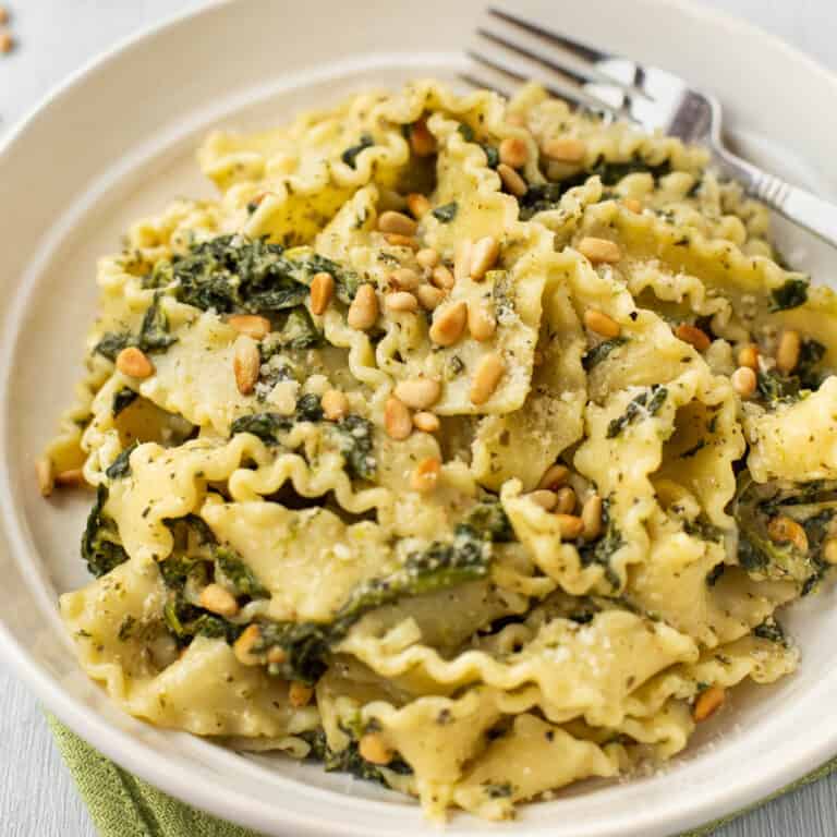 Mafalde pasta with spinach and pine nuts.