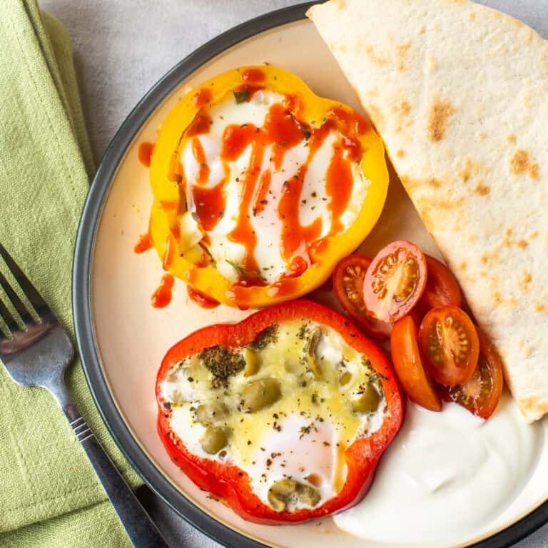 Pepper fried eggs served with a crispy tortilla.