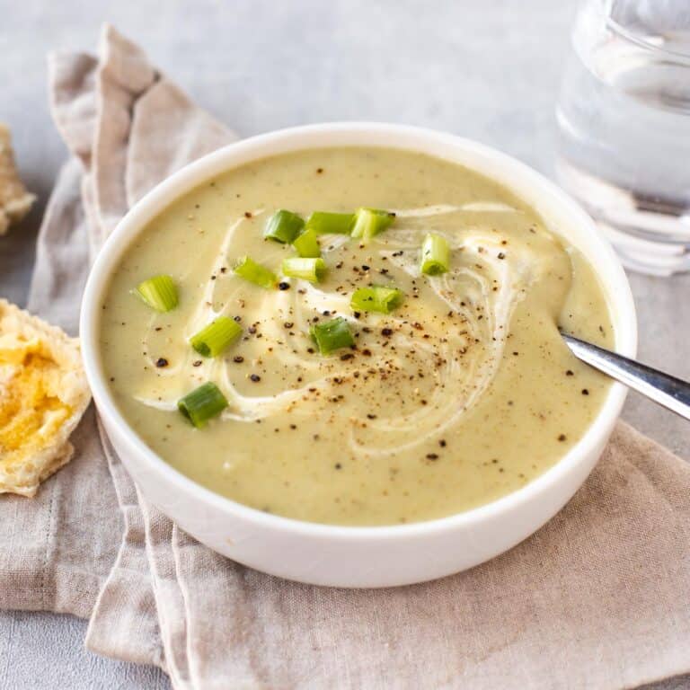 A bowlful of creamy potato and spring onion soup.