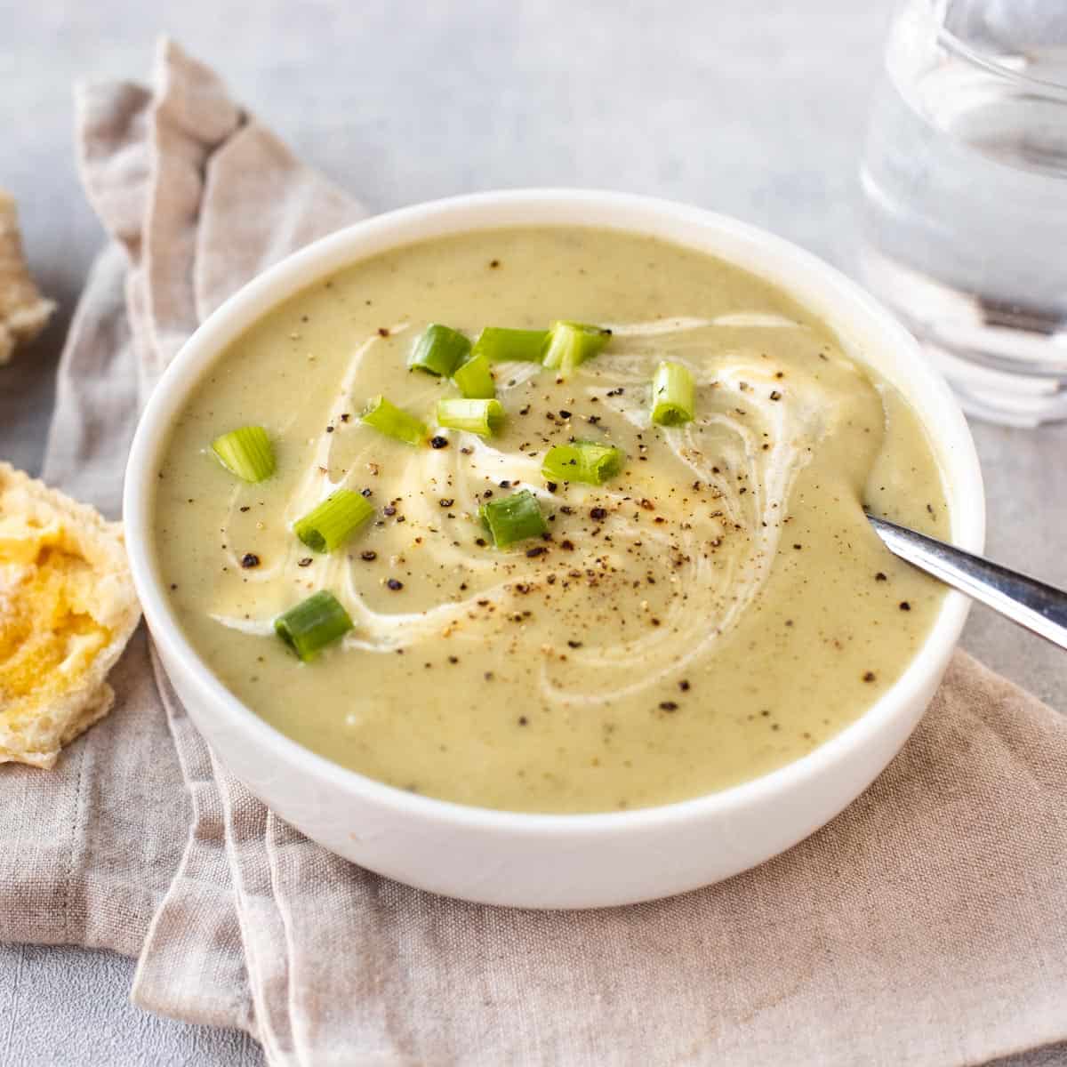 A bowlful of creamy potato and spring onion soup.