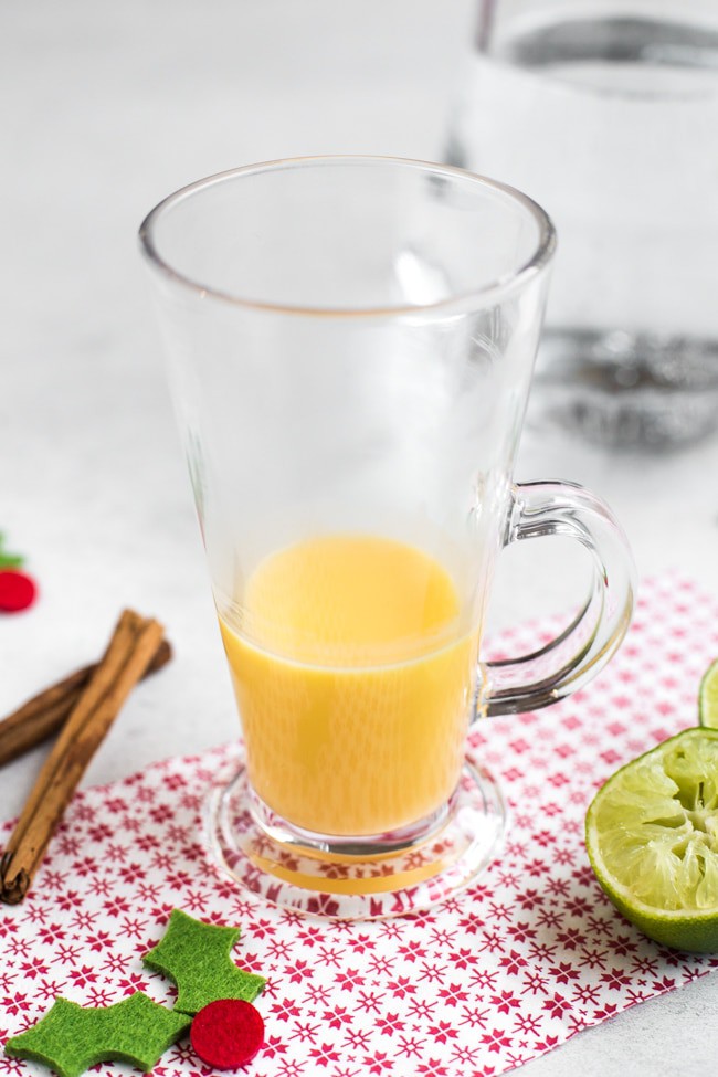 Two shots of Advocaat in a glass mug.