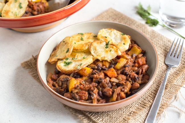 Spicy bean hotpot with crispy potato topping