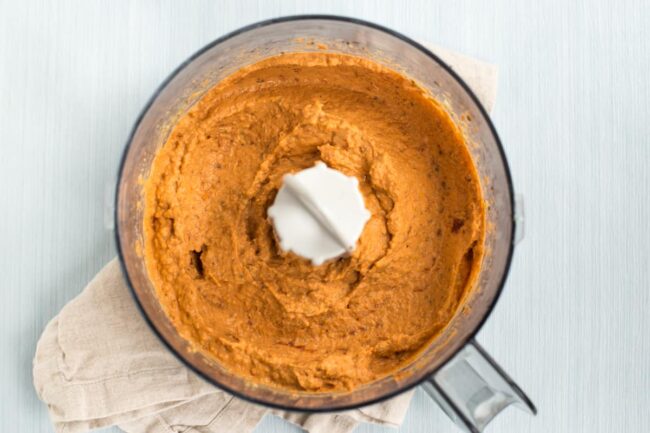Sun-dried tomato hummus in a food processor.