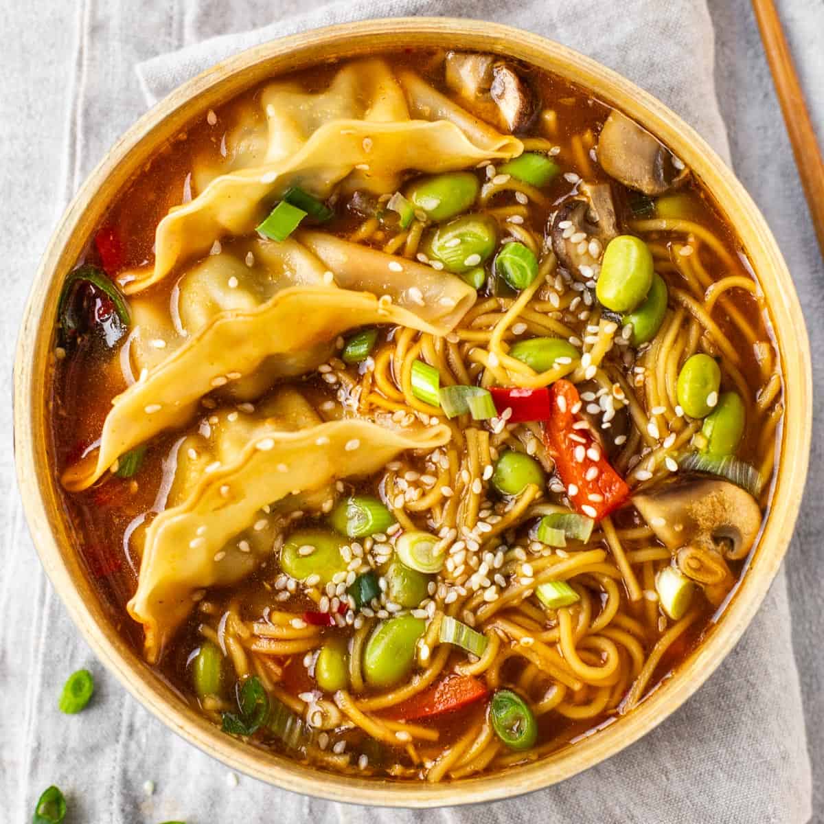 Vegetable gyoza soup in a bowl.