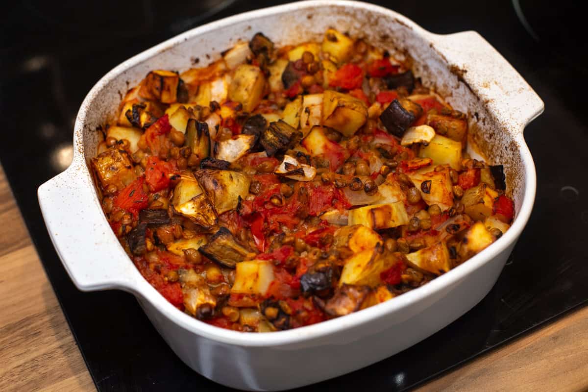 Roasted eggplant and potatoes in tomato sauce.