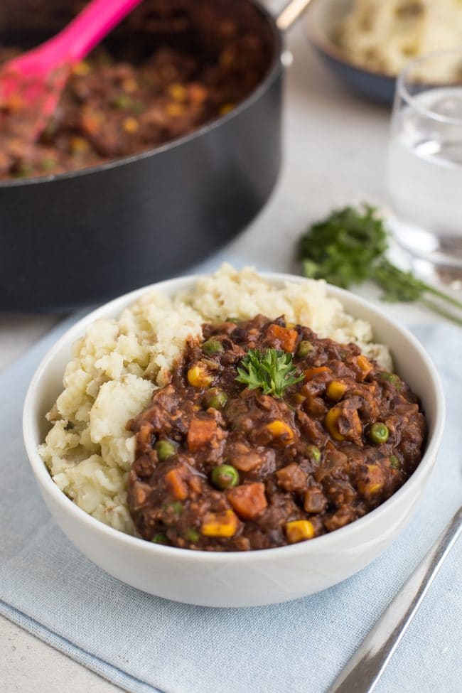 Portion of homemade vegetarian savoury mince in a bowl with mashed potato